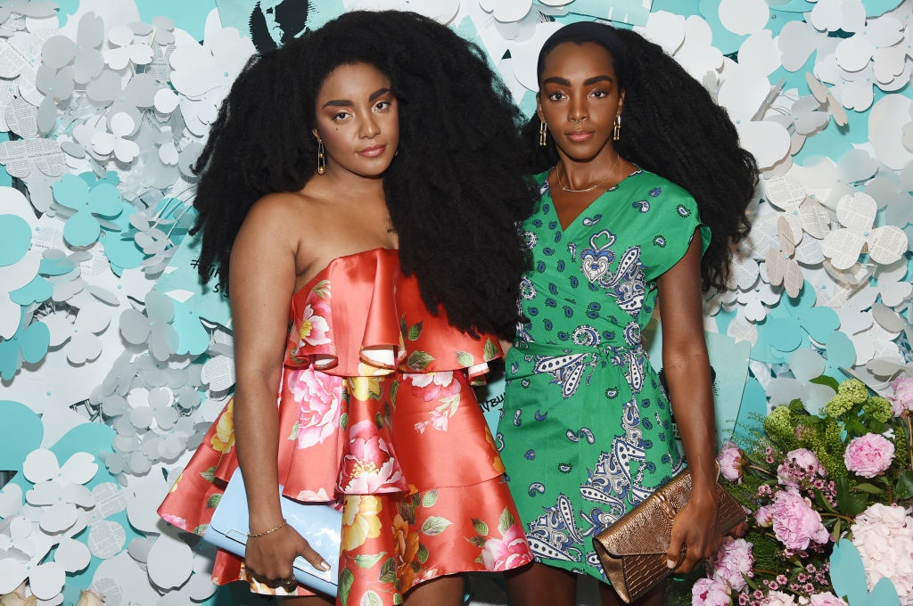 TK Wonder Quann (L) and Cipriana Quann attend the Tiffany & Co. Paper Flowers event and Believe In Dreams campaign launch in New York City