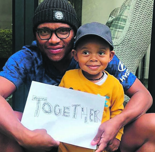 Thuso Phala at home with his son during lockdown 