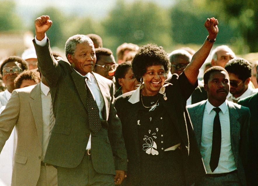 Nelson Mandela walks alongside Winnie Madikizela-Mandela as he is released from Victor Vester Prison in 1990. Picture: Graeme Williams/South Photographs