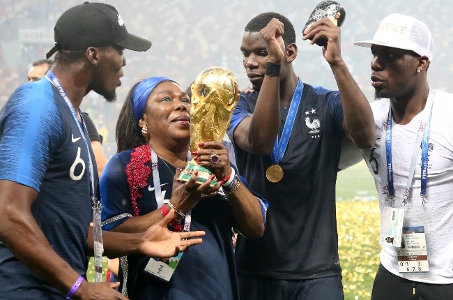 France's Paul Pogba, his mother Yeo and his brothers celebrate