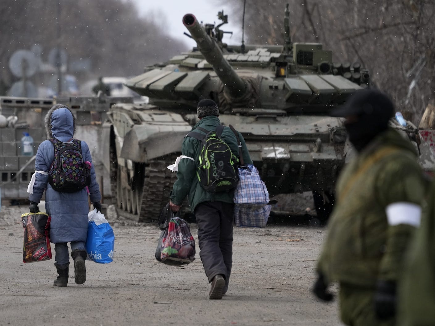 Civilians trapped in Mariupol are evacuated on March 20, 2022. Stringer/Anadolu Agency via Getty Images