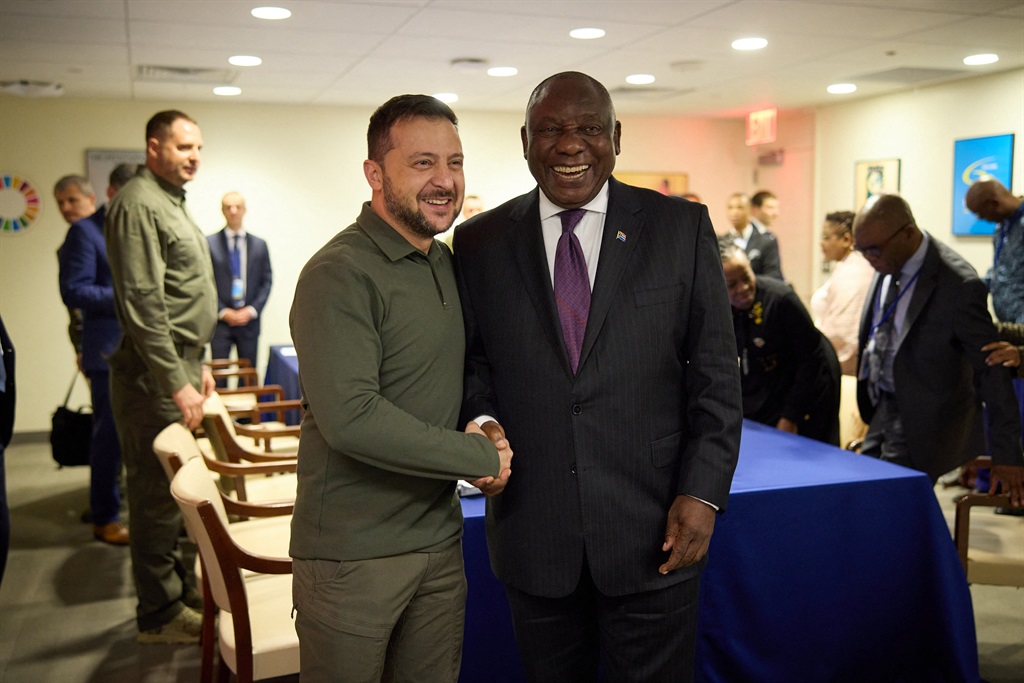 President of Ukraine Volodymyr Zelensky (L) shakes hands with the President of South Africa Cyril Ramaphosa (R) during their meeting in New York. 