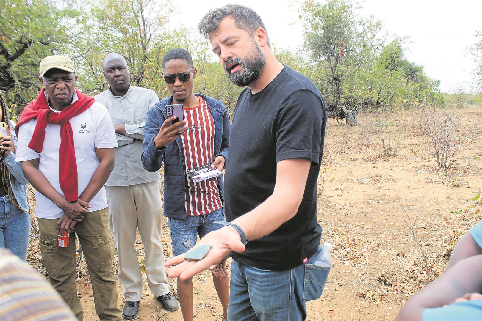Dr Xander Antonites (right) explains some of the artifacts found in the Kruger National Park.                     Photos by Bulelwa Ginindza 