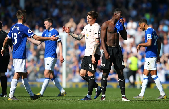 Paul Pogba and Victor Lindelof of Manchester United look dejected following the Premier League match between Everton FC and Manchester United at Goodison Park 