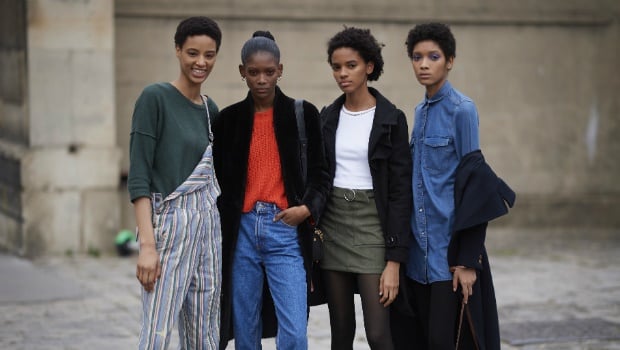 A group of black models with different skin tones, spotted in Paris.