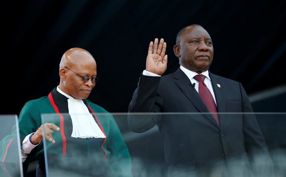 Cyril Ramaphosa takes the oath of office with Chief Justice Mogoeng Mogoeng. Picture: Siphiwe Sibeko/Reuters 