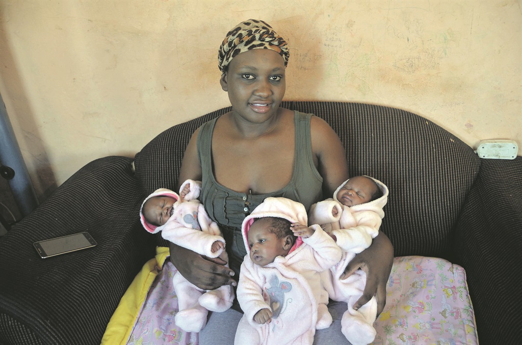 Cyngrid Moalamedi can’t afford to take of her triplets.      Photo by Zamokuhle Mdluli