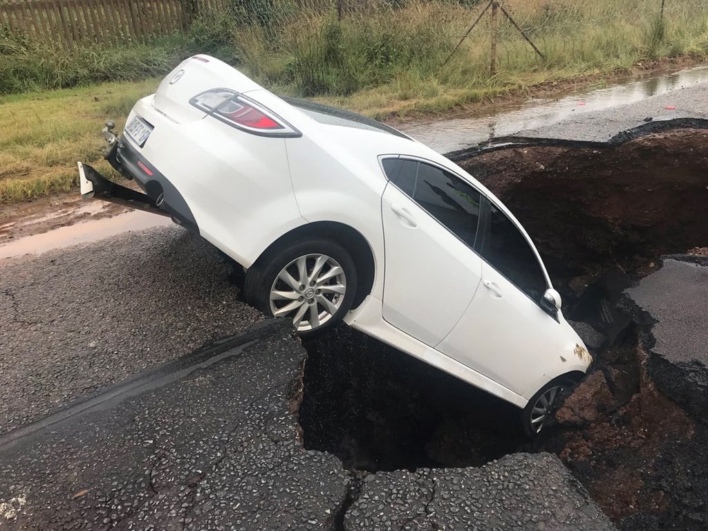 A car stuck in a sinkhole since 7am in Centurion on the R55 going to Valhalla.