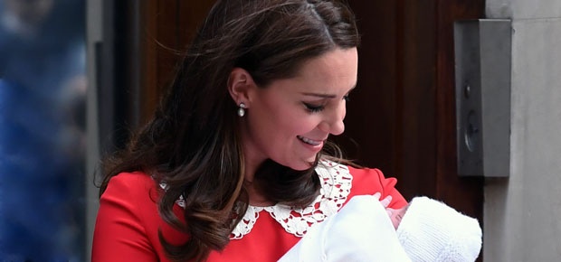 Kate Middleton cradles her newborn son. (Photo: Getty Images)