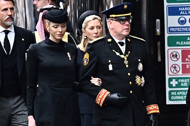 PHOTO | Princess Charlene walks arm in arm with Prince Albert ahead of queen’s funeral service | Channel