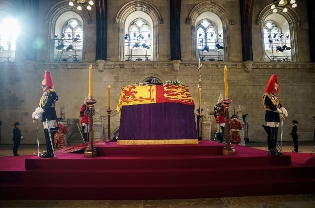 During the lying-in-state period, which took place over four days, the queen's closed coffin rested on a catafalque. It is likely that a cooling device was placed under the casket to help the body stay intact. (PHOTO: Gallo Images/Getty Images) 
