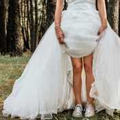 Mom allows teen son to wear her wedding dress to school to protest his friend's suspension