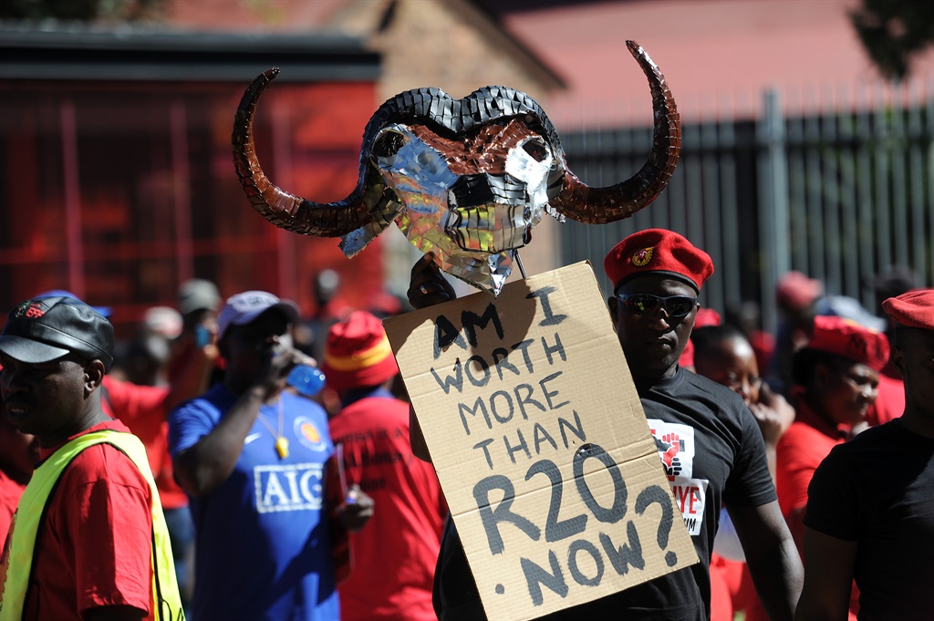 Workers affiliated to the union Saftu marched through the streets of Johannesburg to hand over memorandums at various departments to demand a better wage.Picture: Felix Dlangamandla/Netwerk24