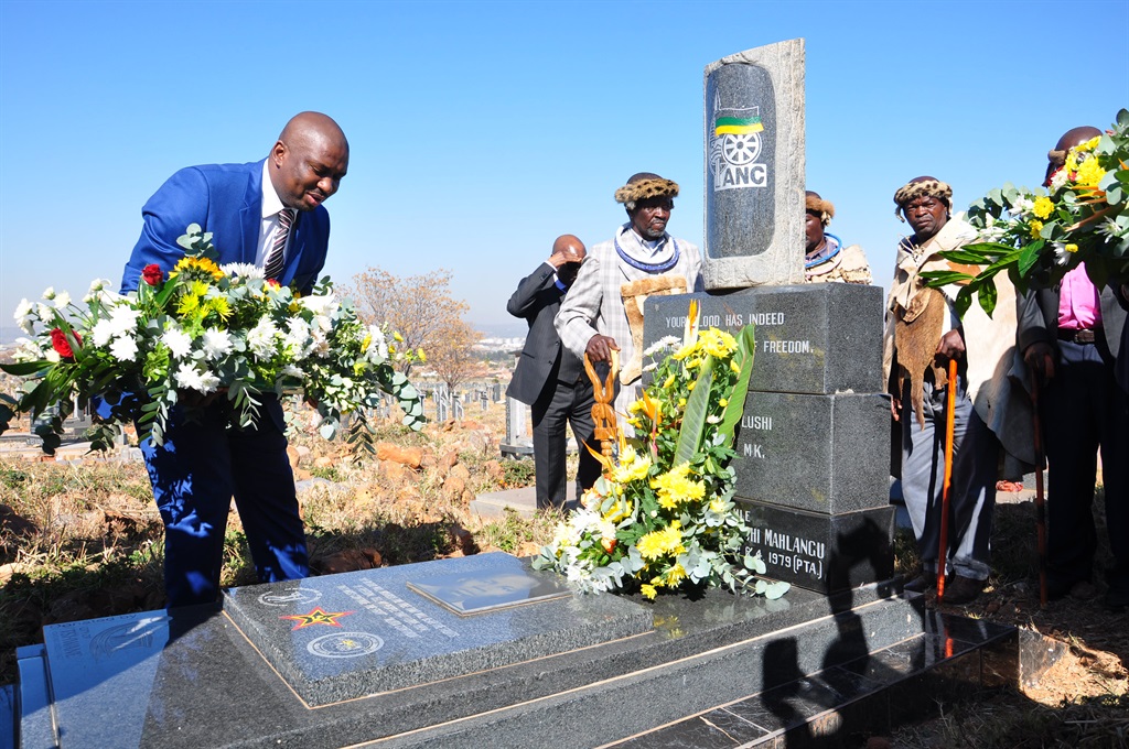 Buti Manamela laying wreaths on the grave of Solomon Mahlangu. Picture: Samson Ratswana