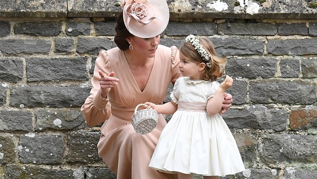 Kate Middleton, Duchess of Cambridge pictured with her daughter, Princess Charlotte on Pippa Middleton's wedding day in May 2017.