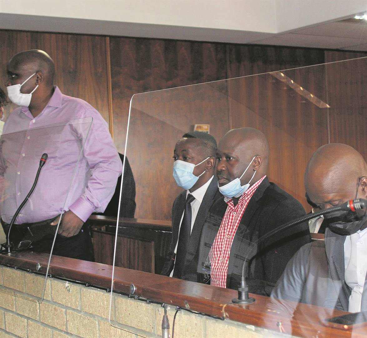 Bongani Bongo (second from right) appeared alongside his co-accused in the Nelspruit Regional Court yesterday.           Photo by Bulelwa Ginindza