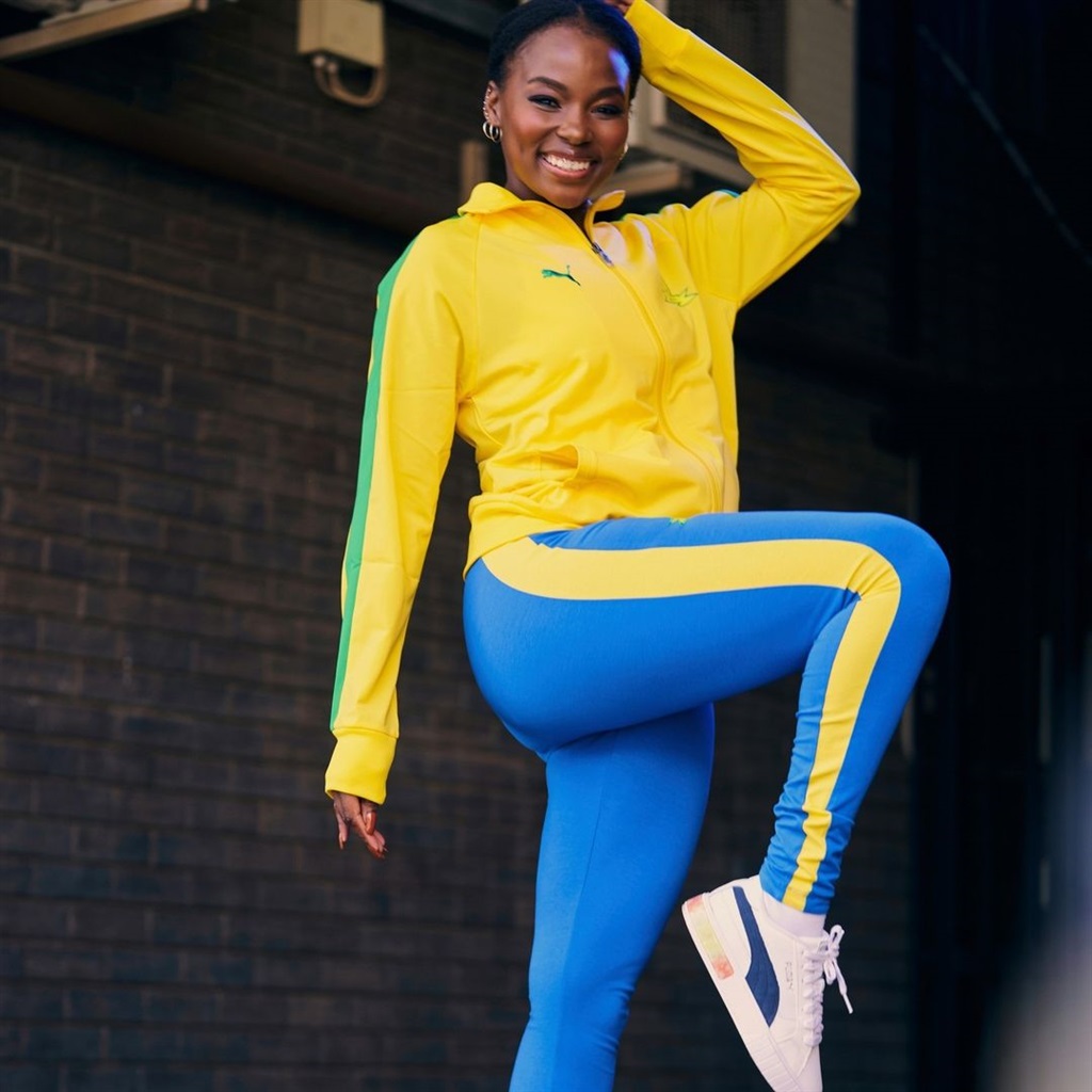 A model in the Sundowns tracksuit top and leggings