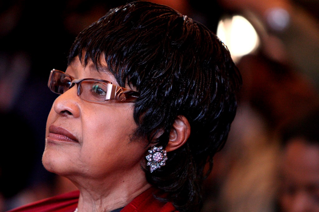 Winnie Madikizela-Mandela listens to a speech at the opening of the newly renovated Mandela House museum in Soweto in March 2009. Picture: Jon Hrusa/EPA