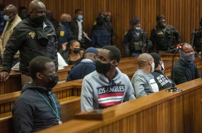 The five men, Mthobisi Mncube, Muzikawukhulelwa Sibiya, Bongani Ntanzi, Mthokoziseni Maphisa, and Fisokuhle Ntuli, charged with the murder of Senzo Meyiwa appear at the high court in Pretoria.