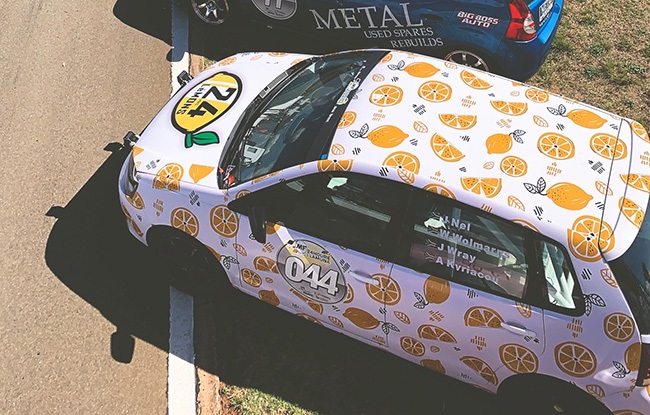A car wrapped in lemon-themed wrapping in spirit o