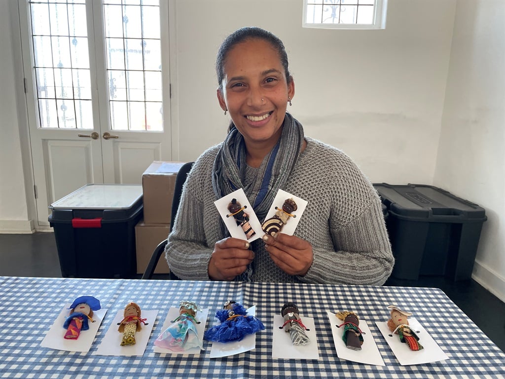 Odette Oliver (39) makes a living creating African 'worry dolls'. She is a survivor of domestic abuse, has battled drug addiction and is slowly rebuilding her life after years of struggle.