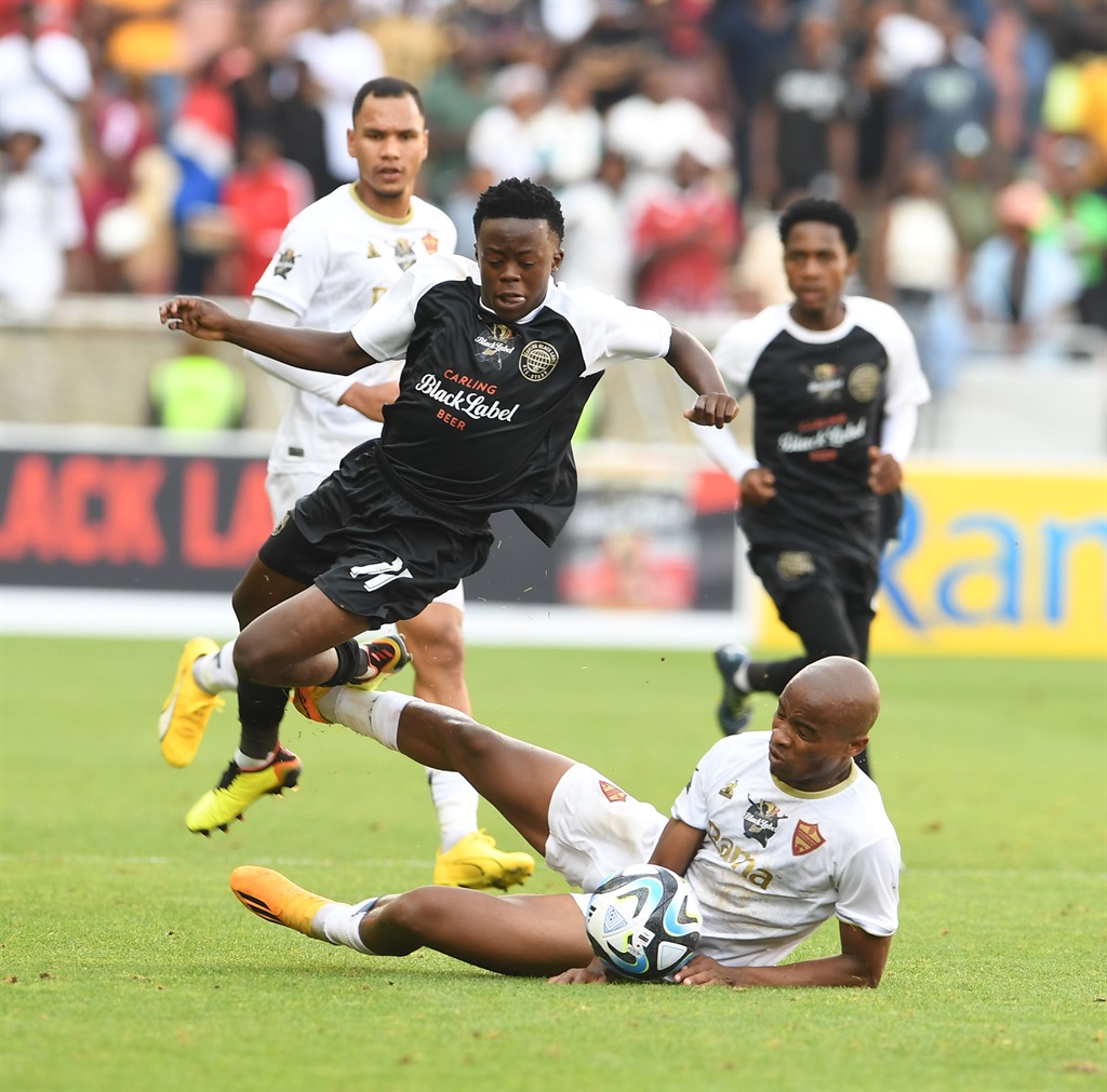 POLOKWANE, SOUTH AFRICA - JANUARY 06: Jabulani Mokone Carling All-Star XI and Athenkosi Mcaba of Stellenbosch FC during the Carling Knockout match between Stellenbosch FC and Carling Knockout All-Star XI at Peter Mokaba Stadium on January 06, 2024 in Polokwane, South Africa. (Photo by Philip Maeta/Gallo Images)