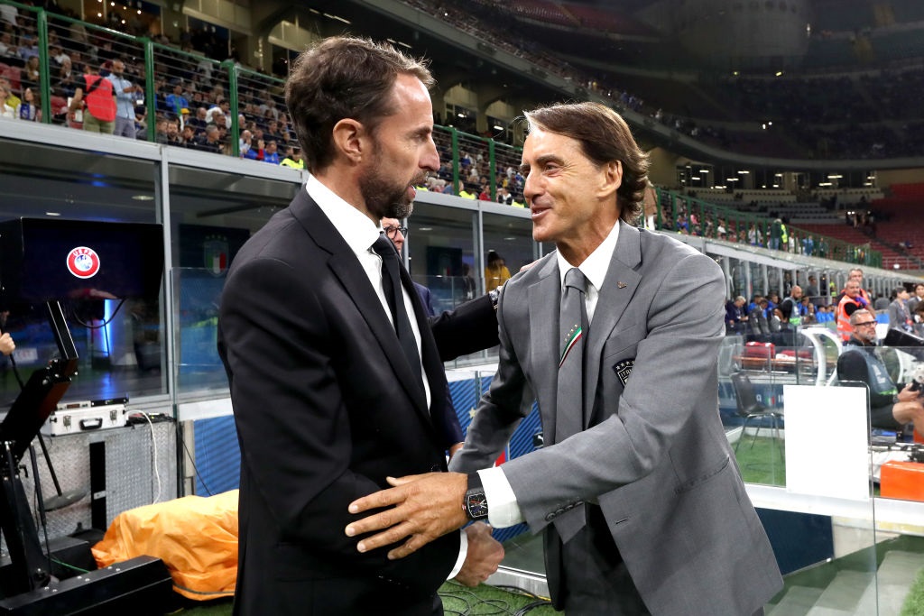MILAN, ITALY - SEPTEMBER 23: Gareth Southgate, Manager of England shakes hands with Roberto Mancini, Head Coach of Italy, prior to kick off of the UEFA Nations League League A Group 3 match between Italy and England at San Siro on September 23, 2022 in Milan, Italy. (Photo by Marco Luzzani/Getty Images)