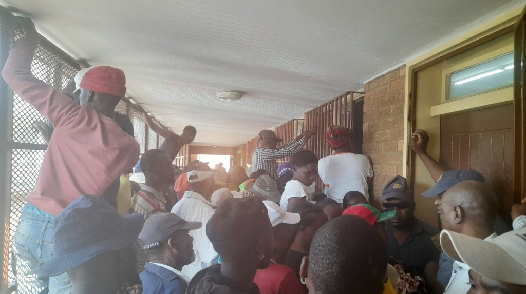 An angry crowd attempted to storm the courtroom where suspects appeared in connection with the mass shooting at Mdlalose Tavern in Nomzamo Park, Soweto.