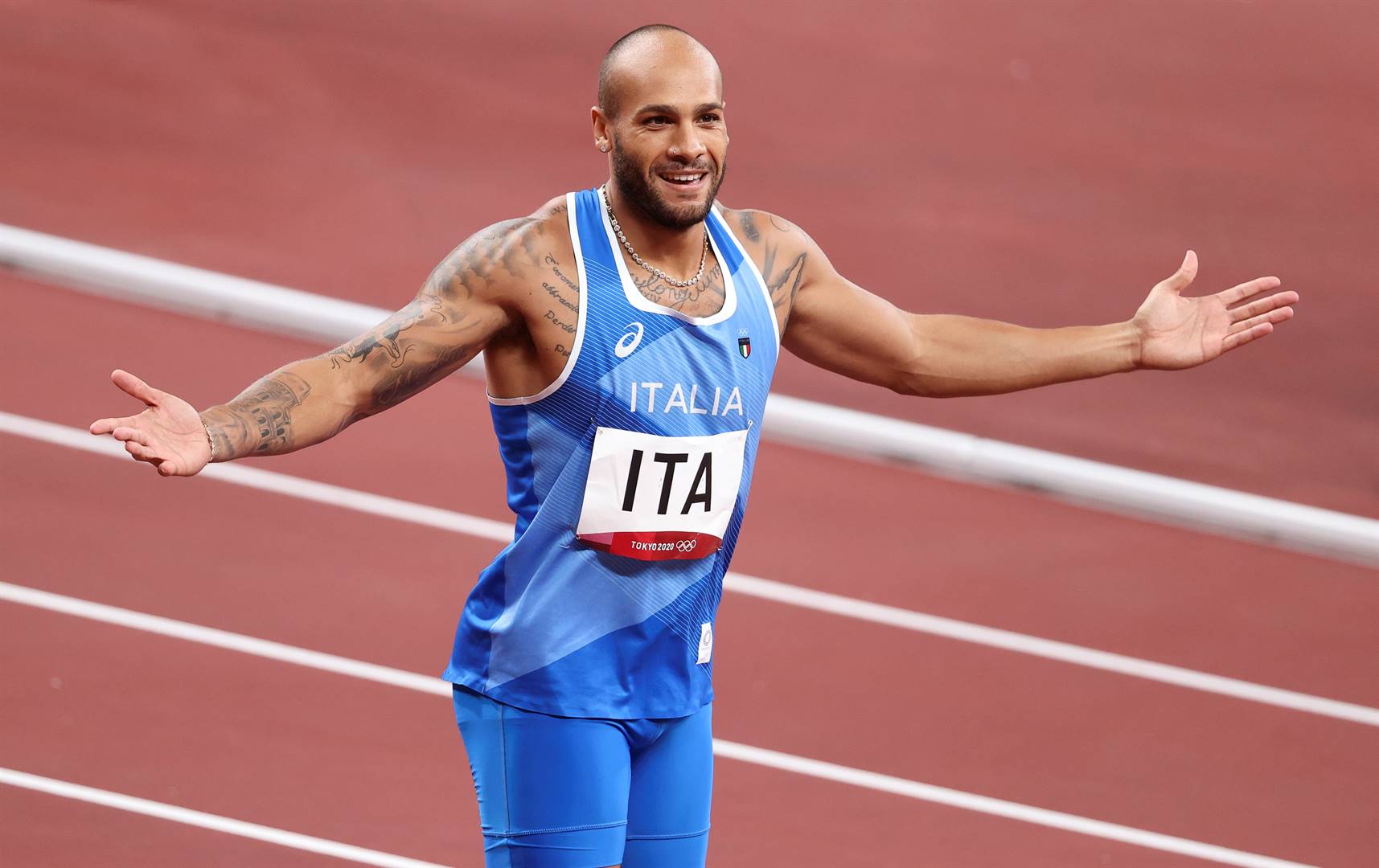 Marcell Jacobs van Italië nadat hy goud in die 100 m by die Tokio-Spele verower het. Foto: Getty Images