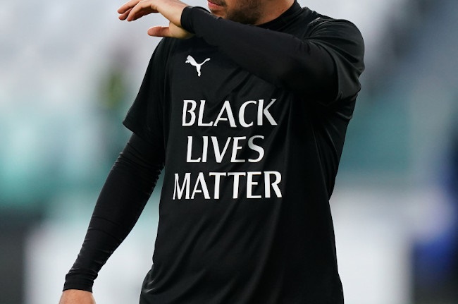 A player with a black lives matter shirt (PA)