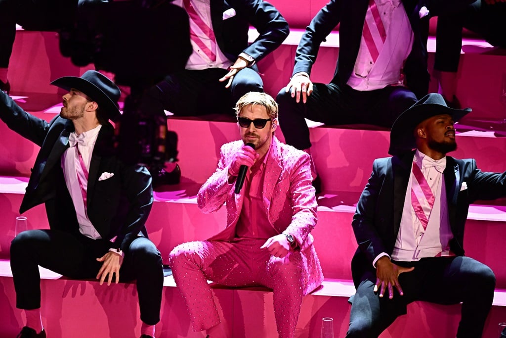 Canadian actor Ryan Gosling (C) performs "I'm Just Ken" from "Barbie" onstage during the 96th Annual Academy Awards. (Patrick T. Fallon/AFP)