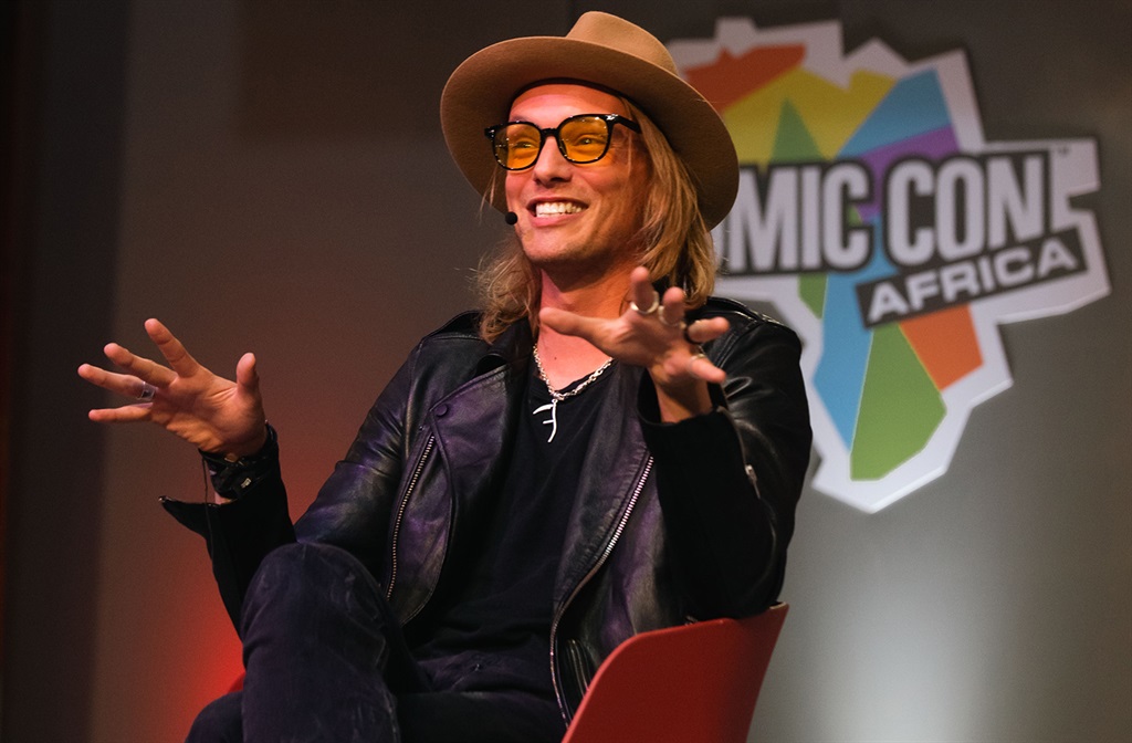 Jamie Campbell Bower attends Comic Con Africa.