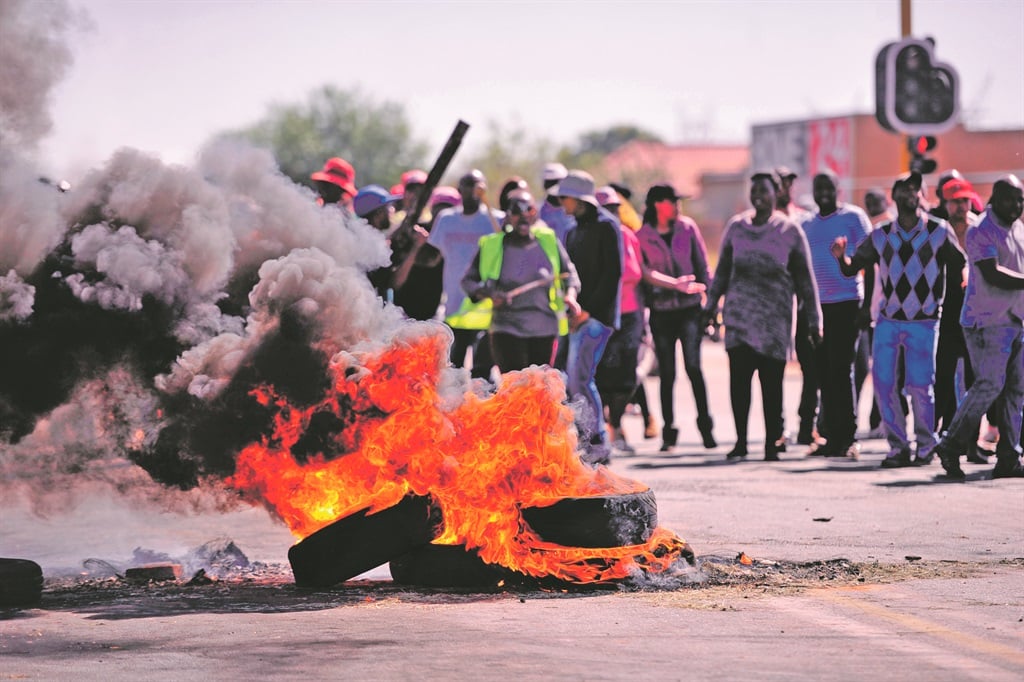 Not in our hood: Residents of Protea Glen, Soweto, have vowed to prevent a group of people from squatting on nearby vacant land. Picture: Christopher Moagi
