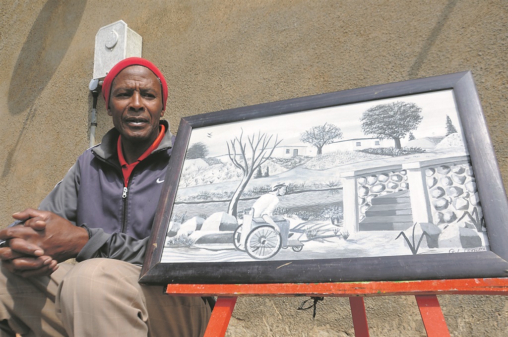 Lestie Lethata (52) with one of his paintings called Help, which is about daily struggles of wheelchair-bound people in Mzansi.Photo By Thabo Monama