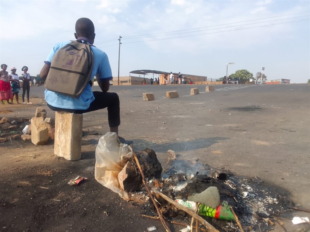 Residents of Winterveldt from Vuma, Vuka and Rand Water section blocked roads with tyres and rocks protesting over electricity which has not been there for two weeks. Photo: Raymond Morare