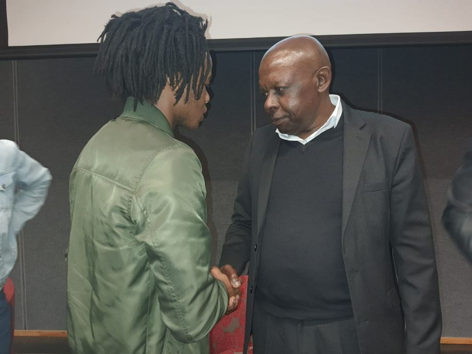 Judge President John Hlophe chats to a student after his guest lecture at UWC. (Photo: Tammy Petersen, News24)