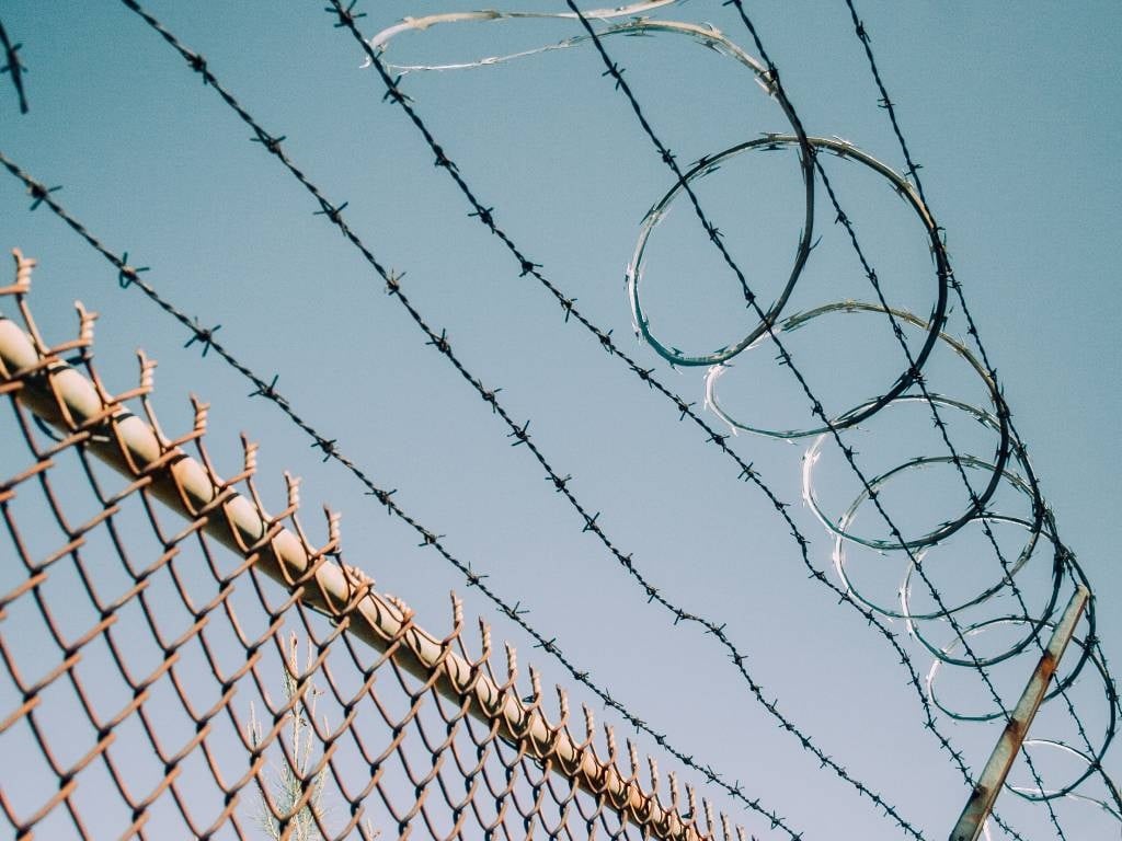 A prison official has been suspended for alleged sexual assault. 