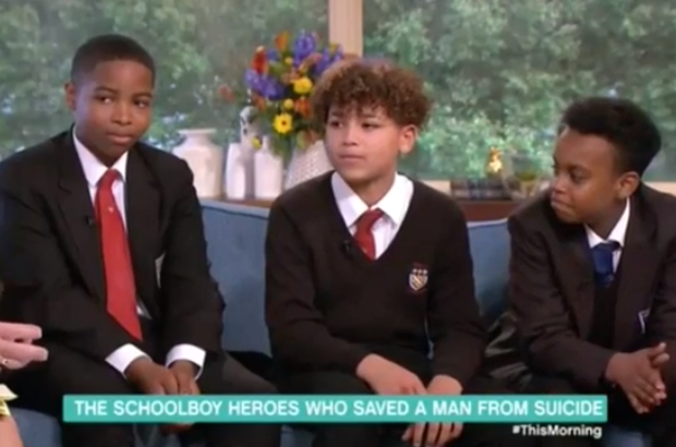 Shawn Young (13), Devonte Cafferkey (13) and Sammy Farah, the 3 schoolboys who tried to talk a man out of committing suicide and held onto him when he jumped. (ITV's This Morning show)