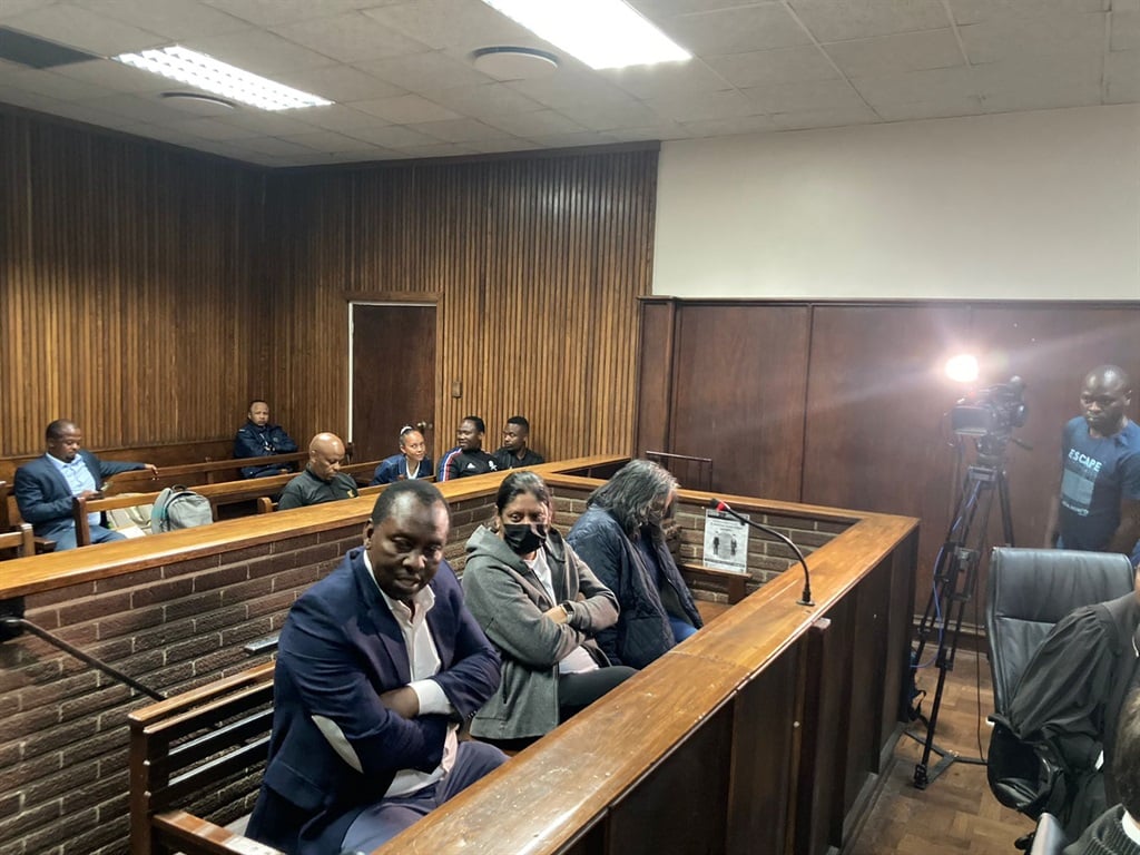 Former minister Mosebenzi Zwane, Ronica Ragavan (centre) and Ugeshni Govender (right) appear in the Bloemfontein Magistrate's Court on 28 September, 2022.