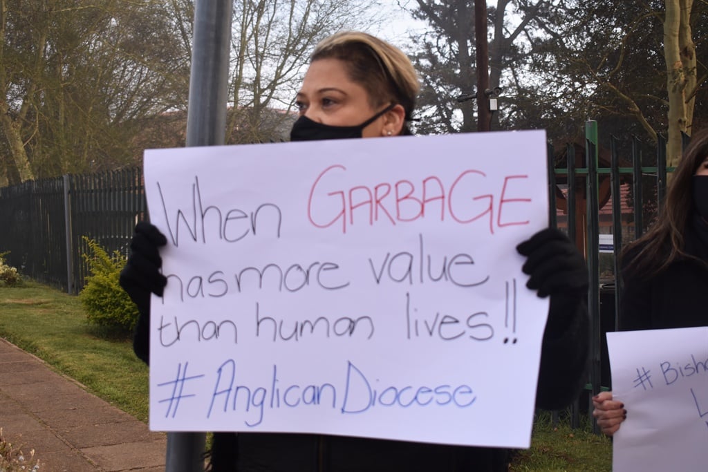 A teacher protests against the closing of Bishop Bavin school in Johannesburg.