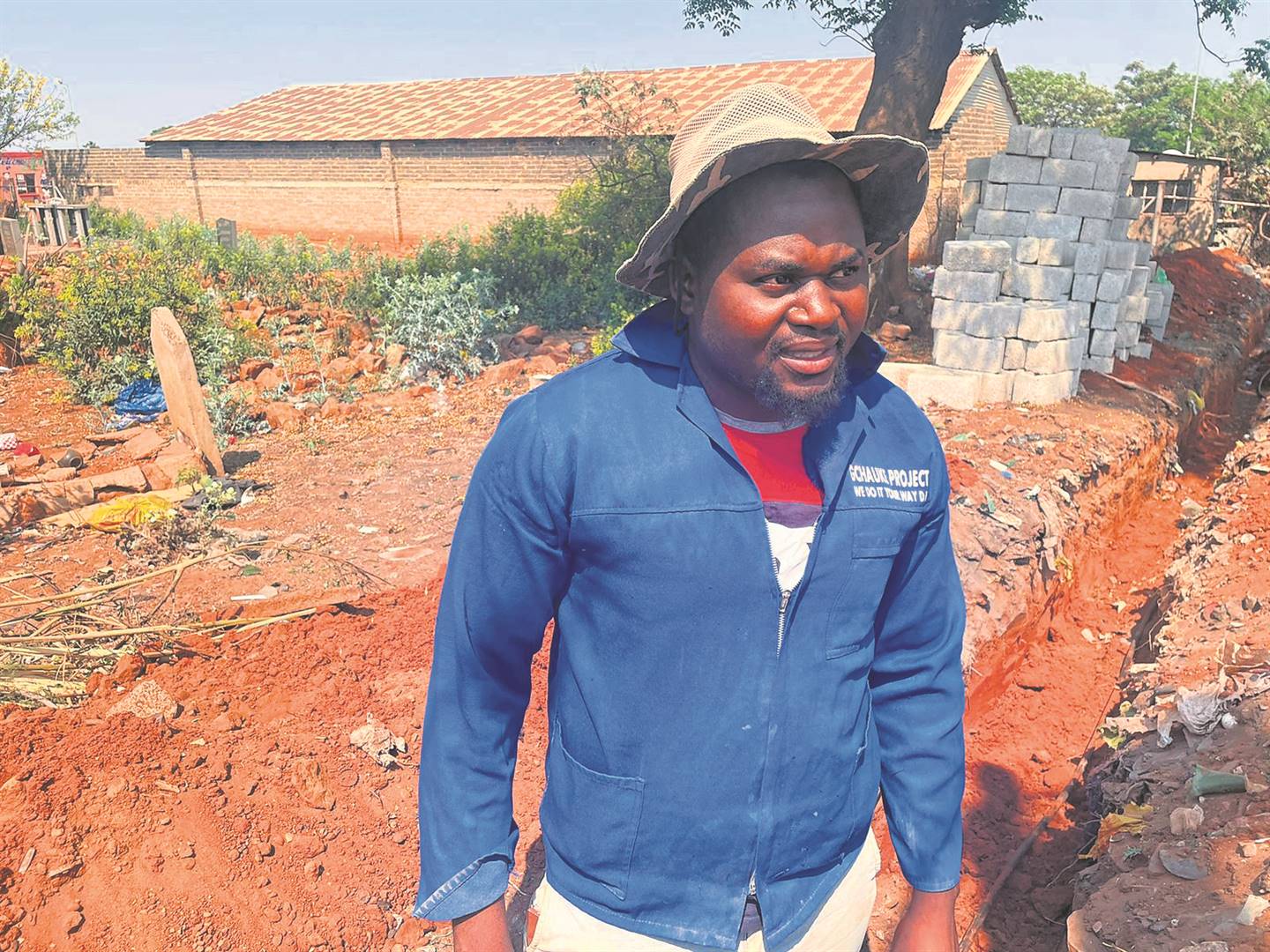 Church leader Given Chauke is relieved a wall’s being built around the Calvary Christ Mission.  Photo   by Kgalalelo Tlhoaele