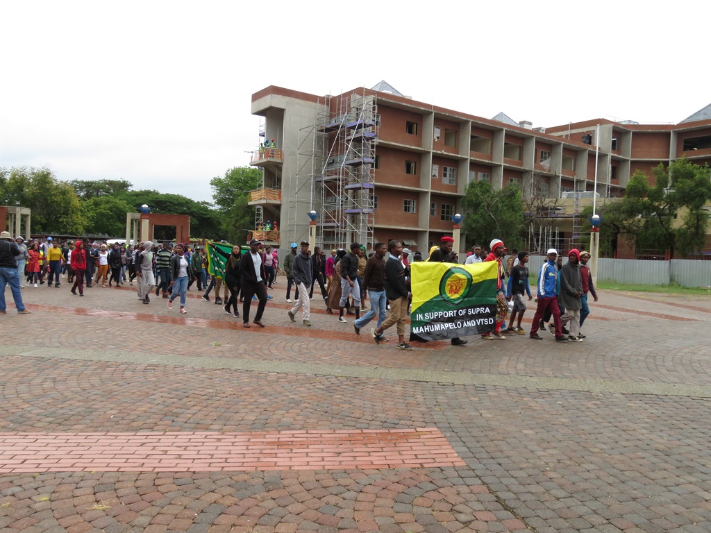 Supporters of the beleaguered premier Supra Mahumapelo march to the North West provincial legislature to express their support for him. Picture: Poloko Tau
