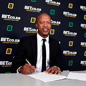 Jimmy Tau signs for BET.co.za (Supplied)