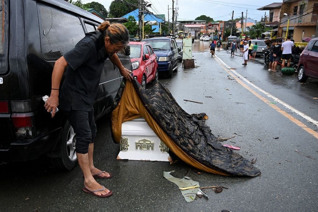 Coffin swept away by floods due to heavy rains
