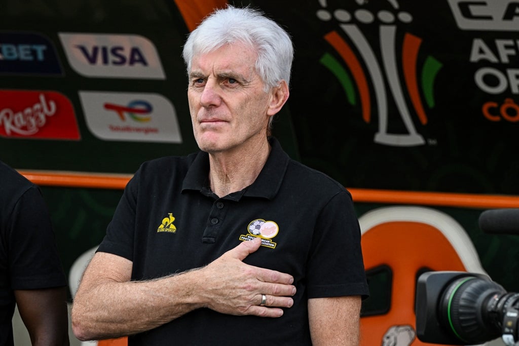 South Africa's head coach Hugo Broos gestures during the national anthem ahead of the Africa Cup of Nations (CAN) 2024 semi-final football match between Nigeria and South Africa at the Stade de la Paix in Bouake on 7 February 2024. 