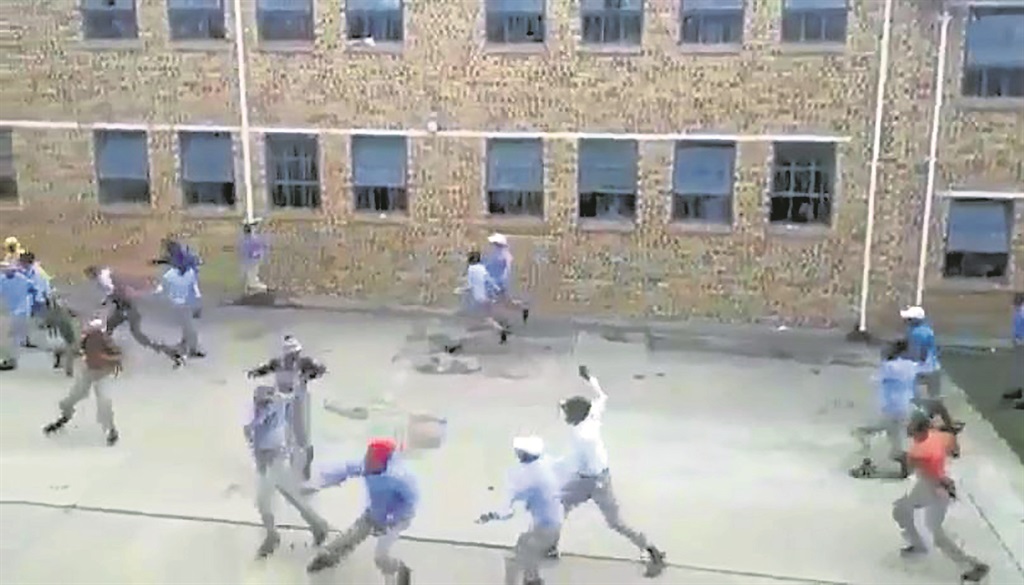 Screengrab from a video clip shows pupils fighting on school premises in Ladysmith.