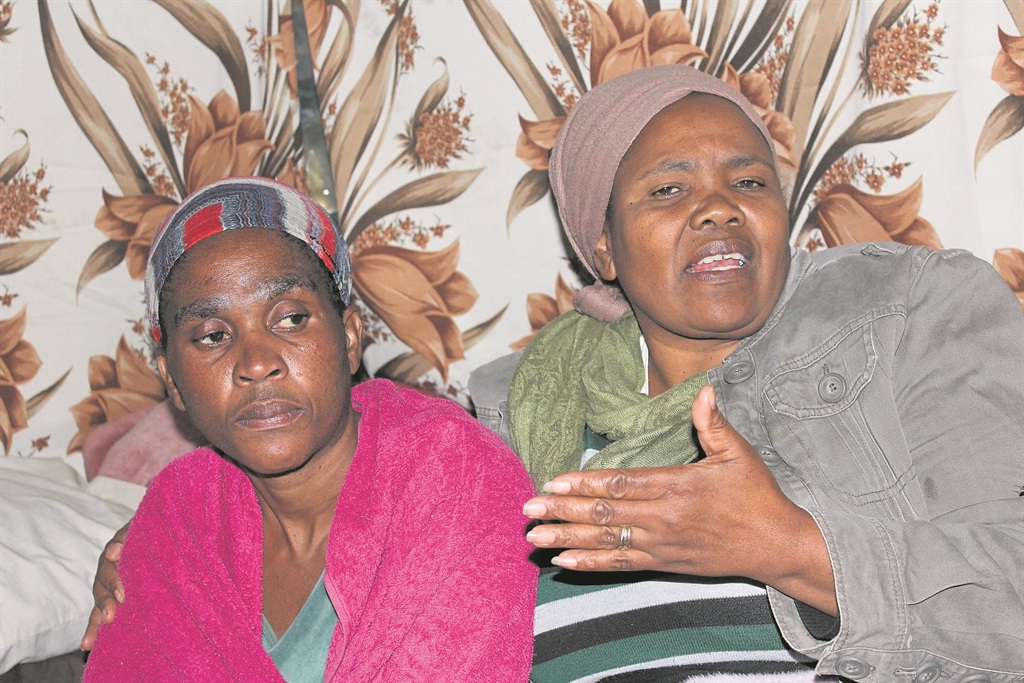 From left: Mum Vuyelwa Mpopo and aunt Vuyiswa Nchaupe cannot understand Pele’s death.   Photo by Sammy Moretsi 