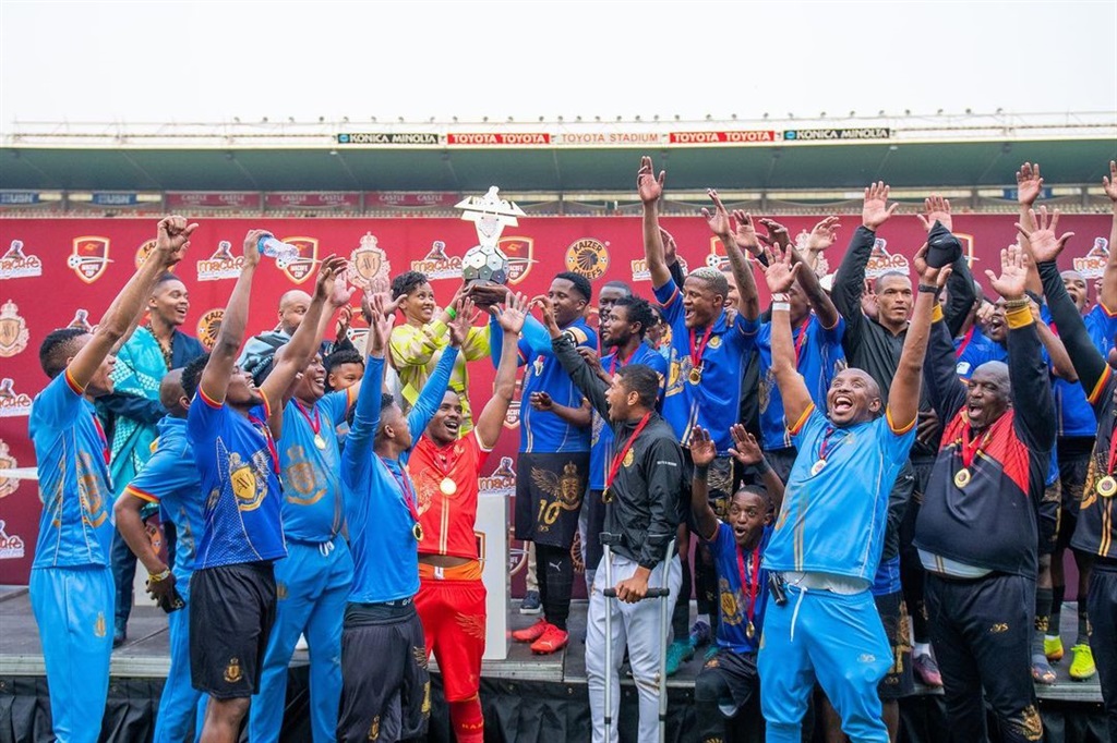 Royal AM lifting the Macufe Cup.