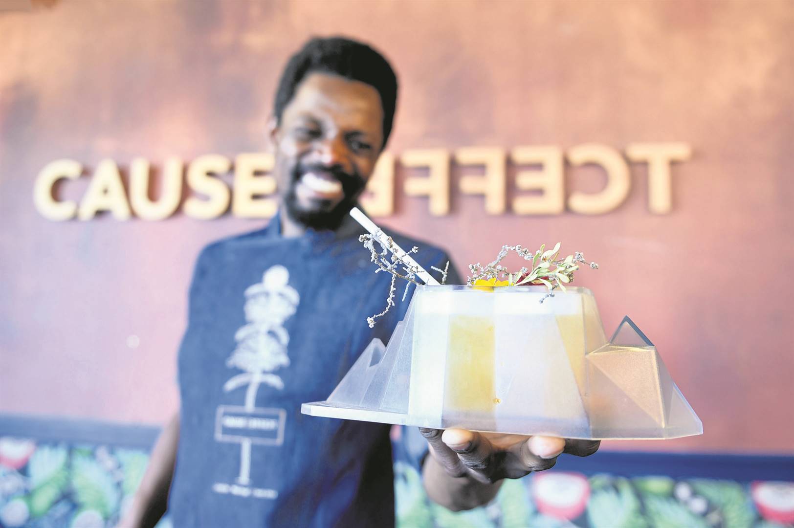 Michael Mudzenda presents a drink from Cause Effect Cocktail Kitchen in Cape Town. Photo: Edrea du Toit
