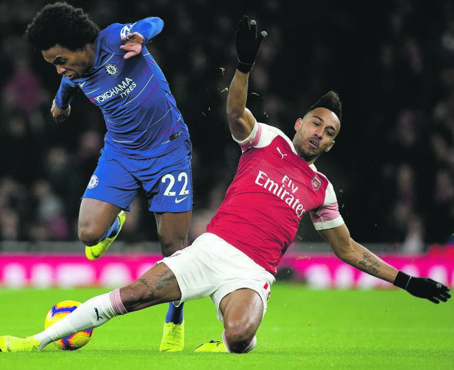  Willian of Chelsea and Pierre-Emerick Aubameyang of Arsenal do battle on the field. The two sides will contest the Europa League Cup on Wednesday. Picture: Visionhaus /Getty Images